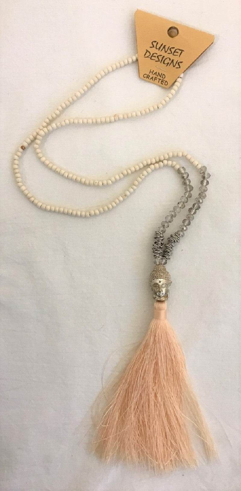 necklace - cream - silver budha head - clear crystal/metal ring beads - string tassle